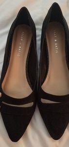 Black flats with pearl buttons